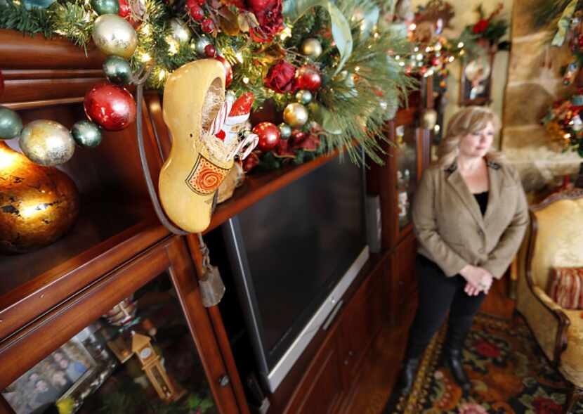 Sheri Geisler of Double Oak incorporated her wooden shoe collection into the Christmas...