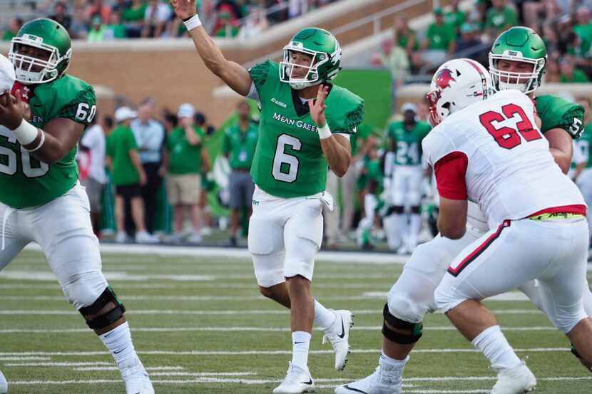North Texas sophomore quarterback Mason Fine (6) passes the ball to a teammate against the...