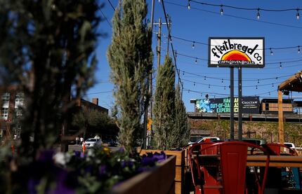The patio at Flatbread Company in Dallas looks out over Greenville Avenue and seats more...