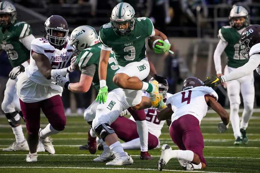 Frisco Reedy running back Dennis Moody (3) gets past Mansfield Timberview defensive back Jon...