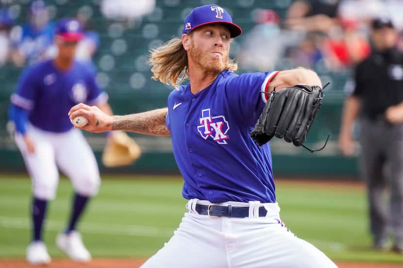 Texas Rangers pitcher Mike Foltynewicz delivers during the second inning of a spring...