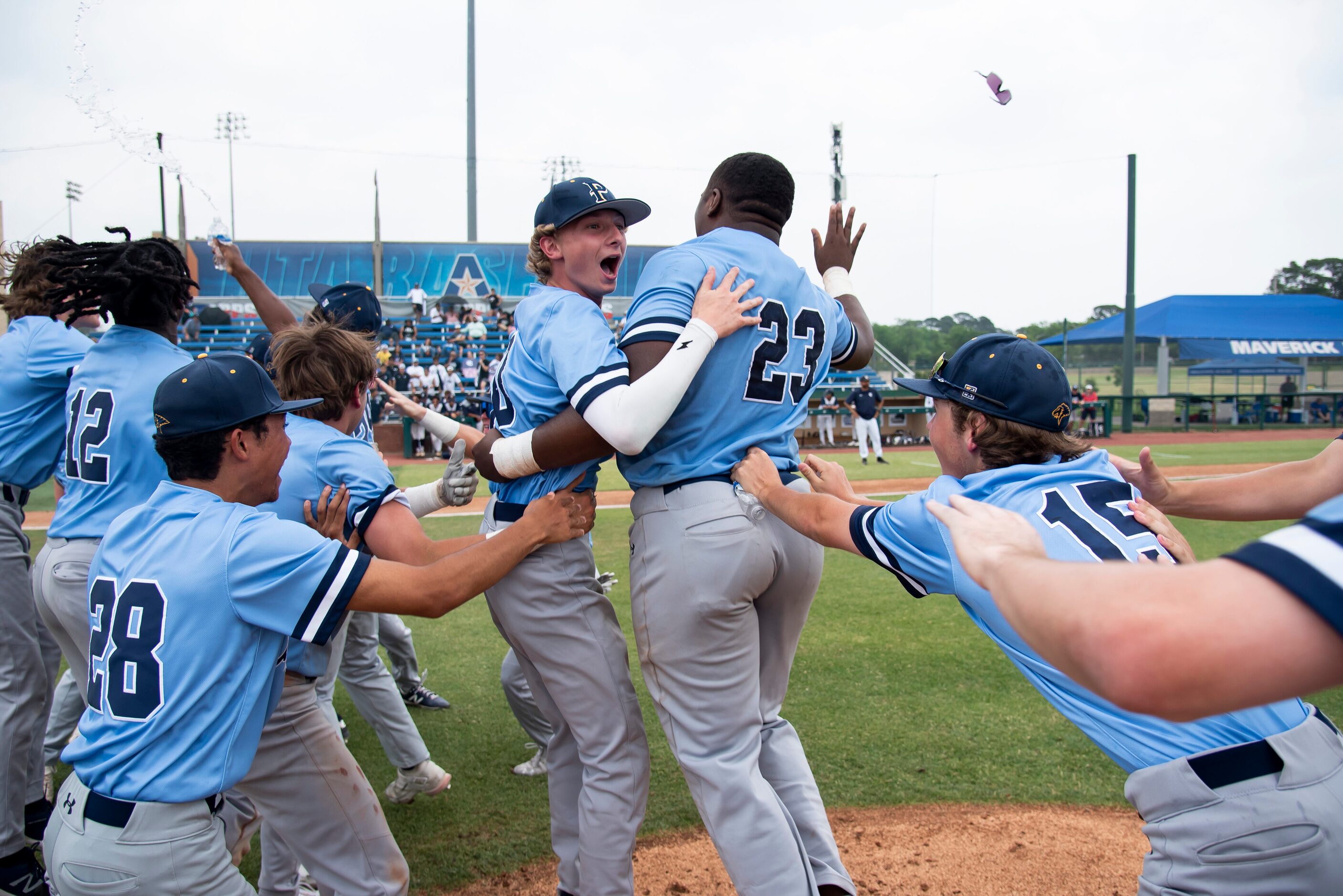 Prestonwood players celebrate after making the final out to win the TAPPS Division I...