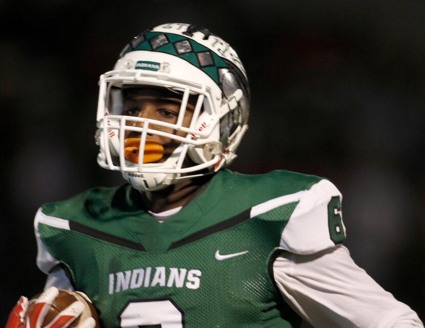 Waxahachie receiver Demani Richardson (6) rambles into the end zone with a first quarter...