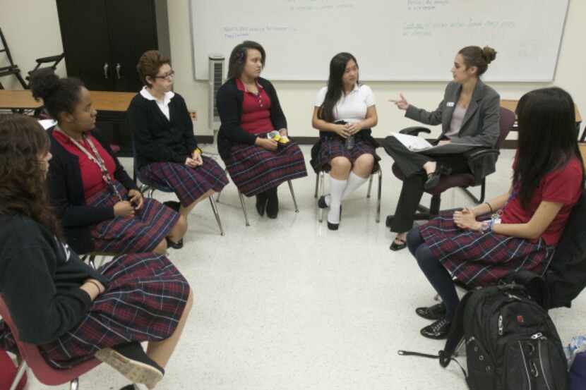 Hannah Alexander of Ignite Texas leads girls in discussion at Irma Lerma Rangel Young...