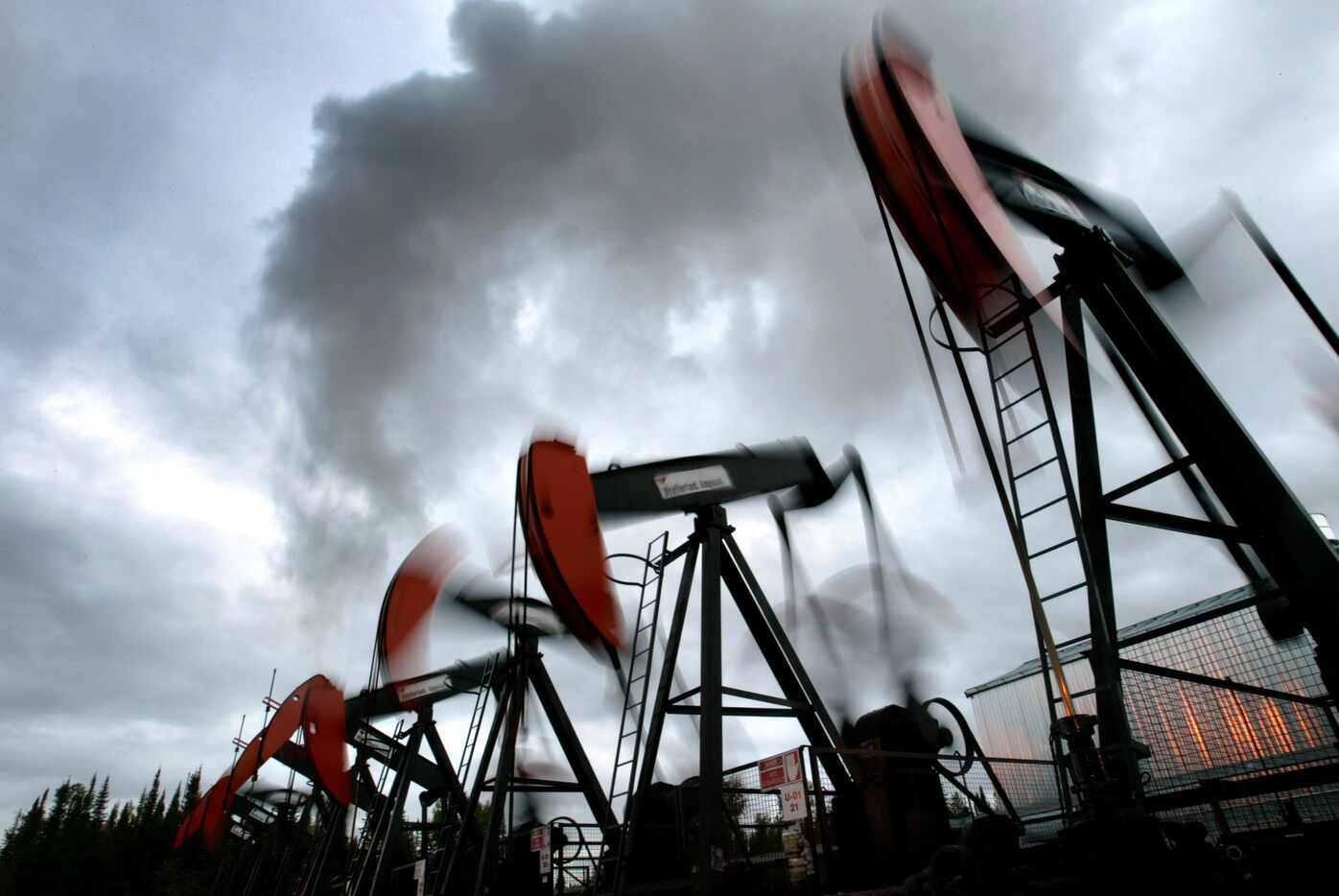 2005 FILE PHOTO -- Clusters of pump jacks at Imperial Oil Ltd.'s Cold Lake project  work to...