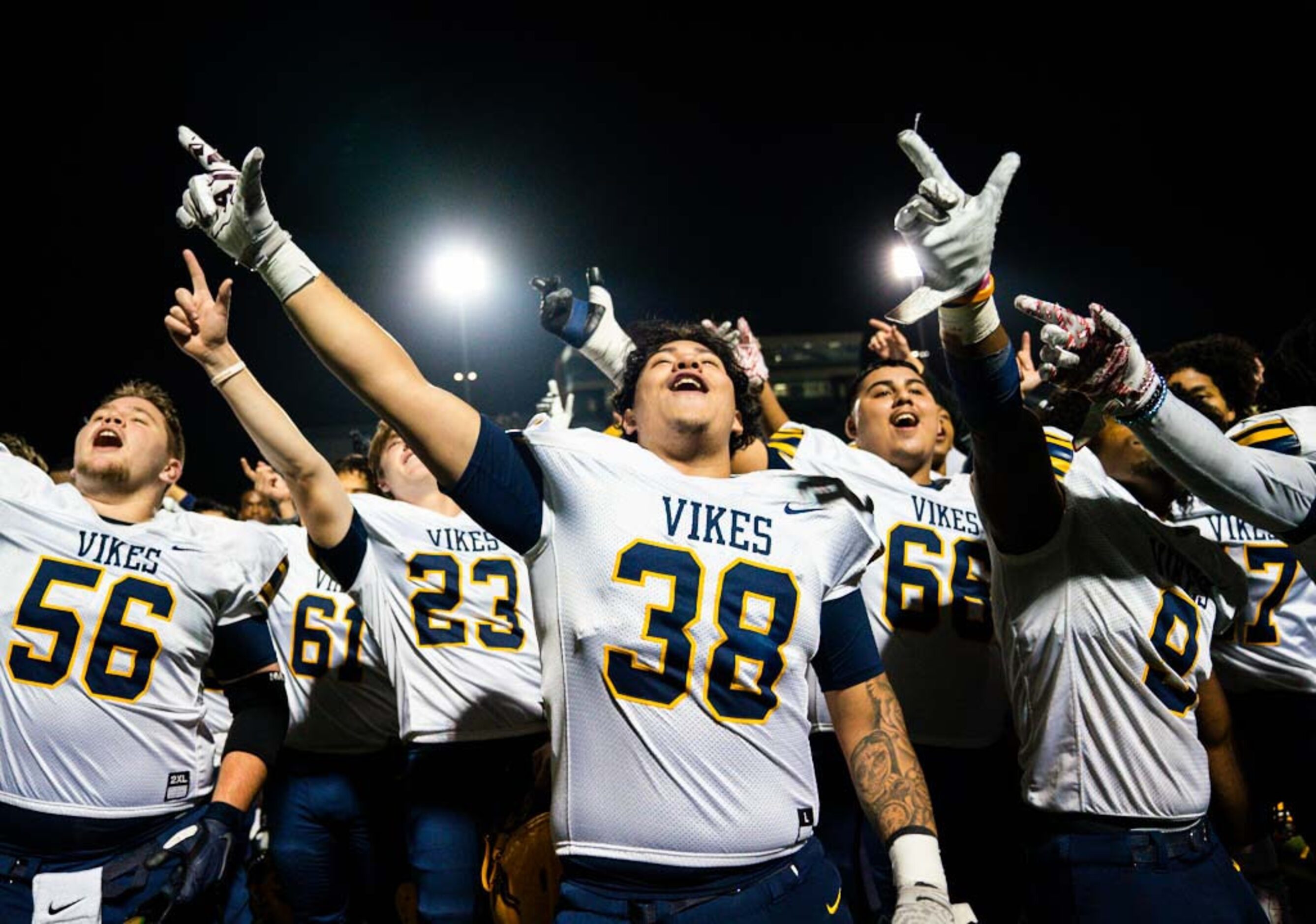 Arlington Lamar players celebrate after winning a UIL Class 6A Division I bi-district...