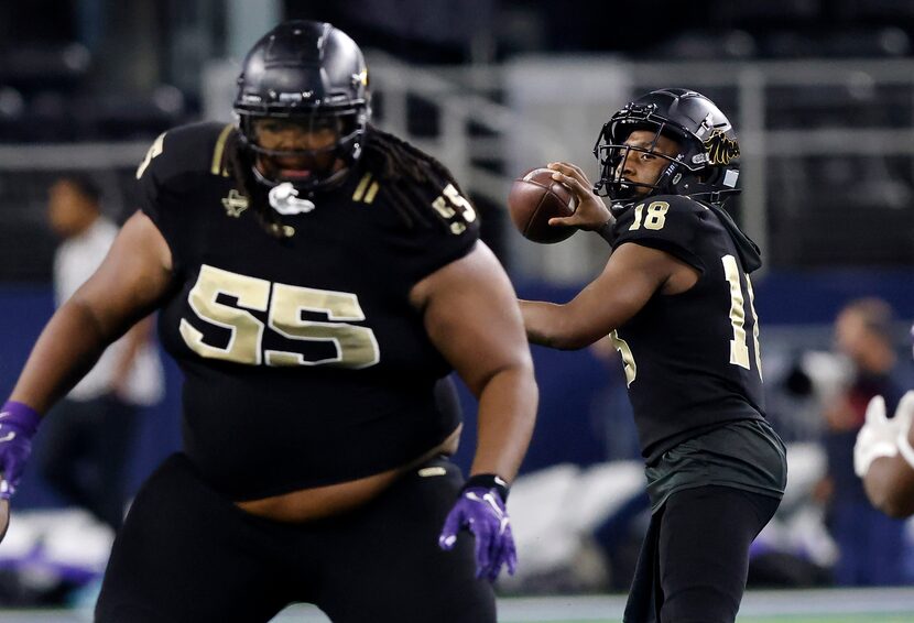 With blocking by offensive lineman Brione Ramsey-Brooks (55), South Oak Cliff quarterback...