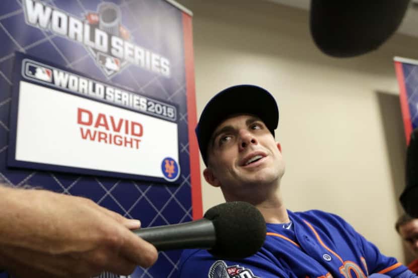 New York Mets third baseman David Wright talks during media day for the Major League...