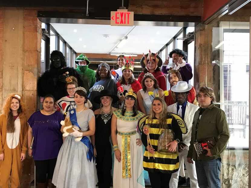 Ambit Energy workers show off their Halloween costumes.