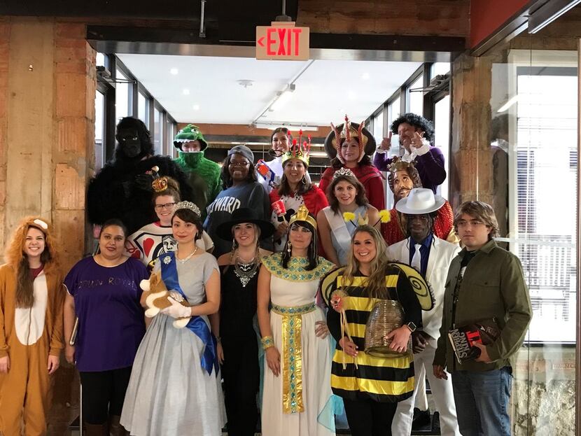 Ambit Energy workers show off their Halloween costumes.