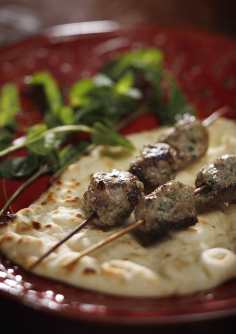 Kefta is a common Middle Eastern meatball that's cooked on a skewer and served with pita bread.