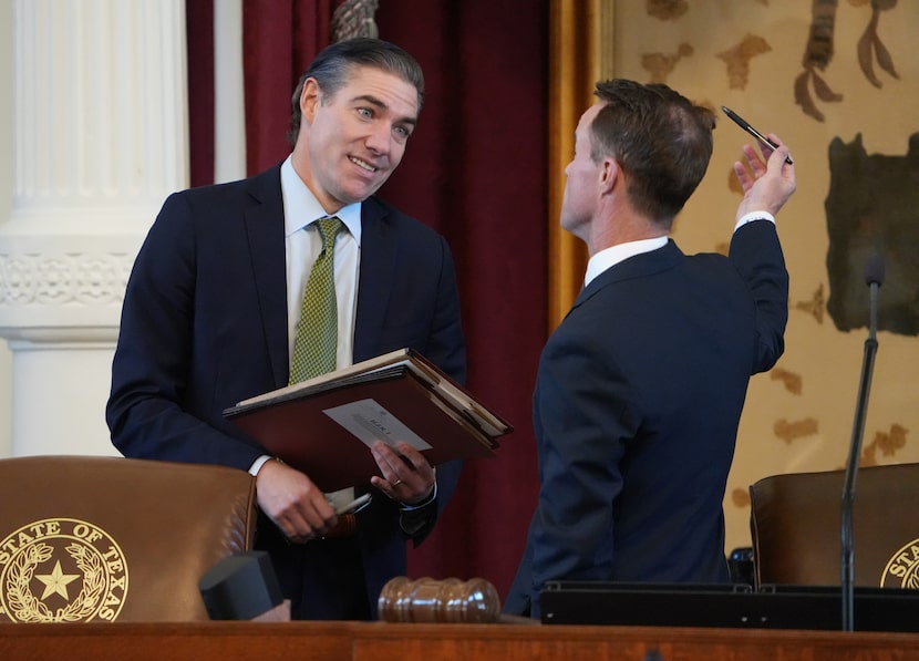 Rep. Morgan Meyer, R-University Park, left, talks to Speaker Dade Phelan on the first day of...