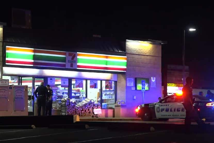 Police investigate a fatal shooting at a 7-Eleven just after midnight, Nov. 10, 2020, in the...