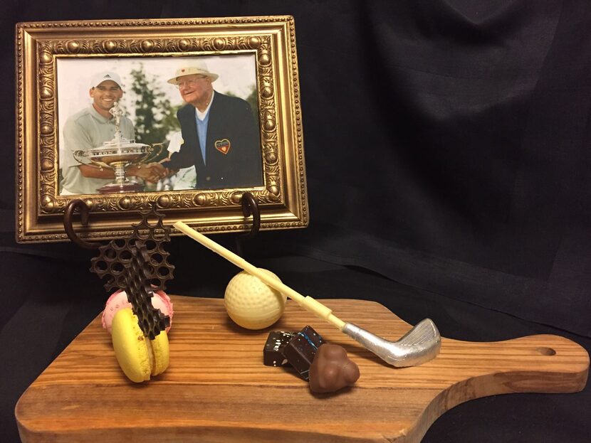 This and similar deserts were made for former Nelson champs. The frame is made of chocolate;...