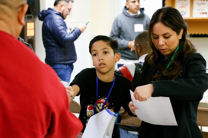 Asher Vargas worked alongside volunteer coordinator Catalina Muñiz at Oak Lawn United...