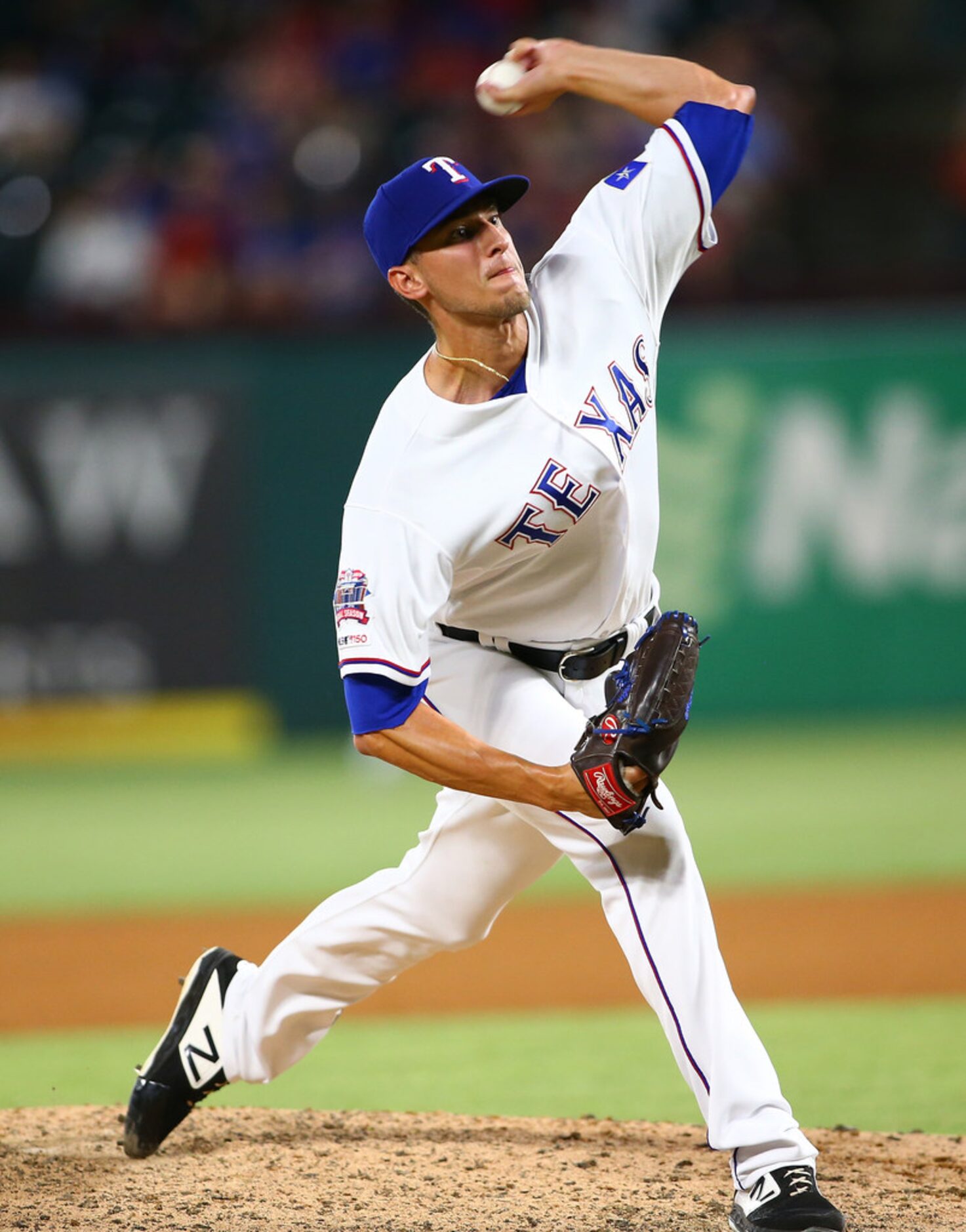 ARLINGTON, TX - JUNE 04: Brett Martin #59 of the Texas Rangers pitches in the seventh inning...