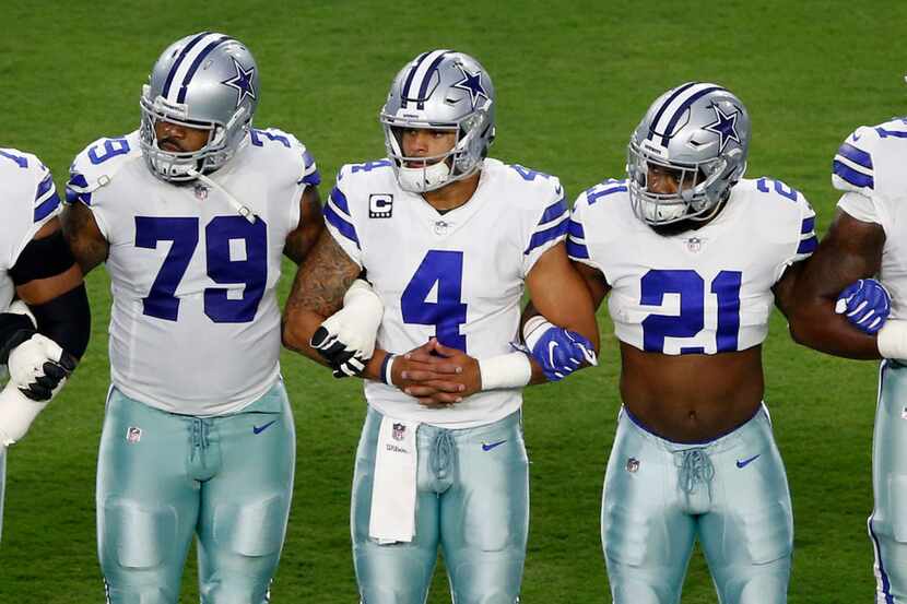 Dallas Cowboys offensive guard Chaz Green (79), Dallas Cowboys quarterback Dak Prescott (4),...