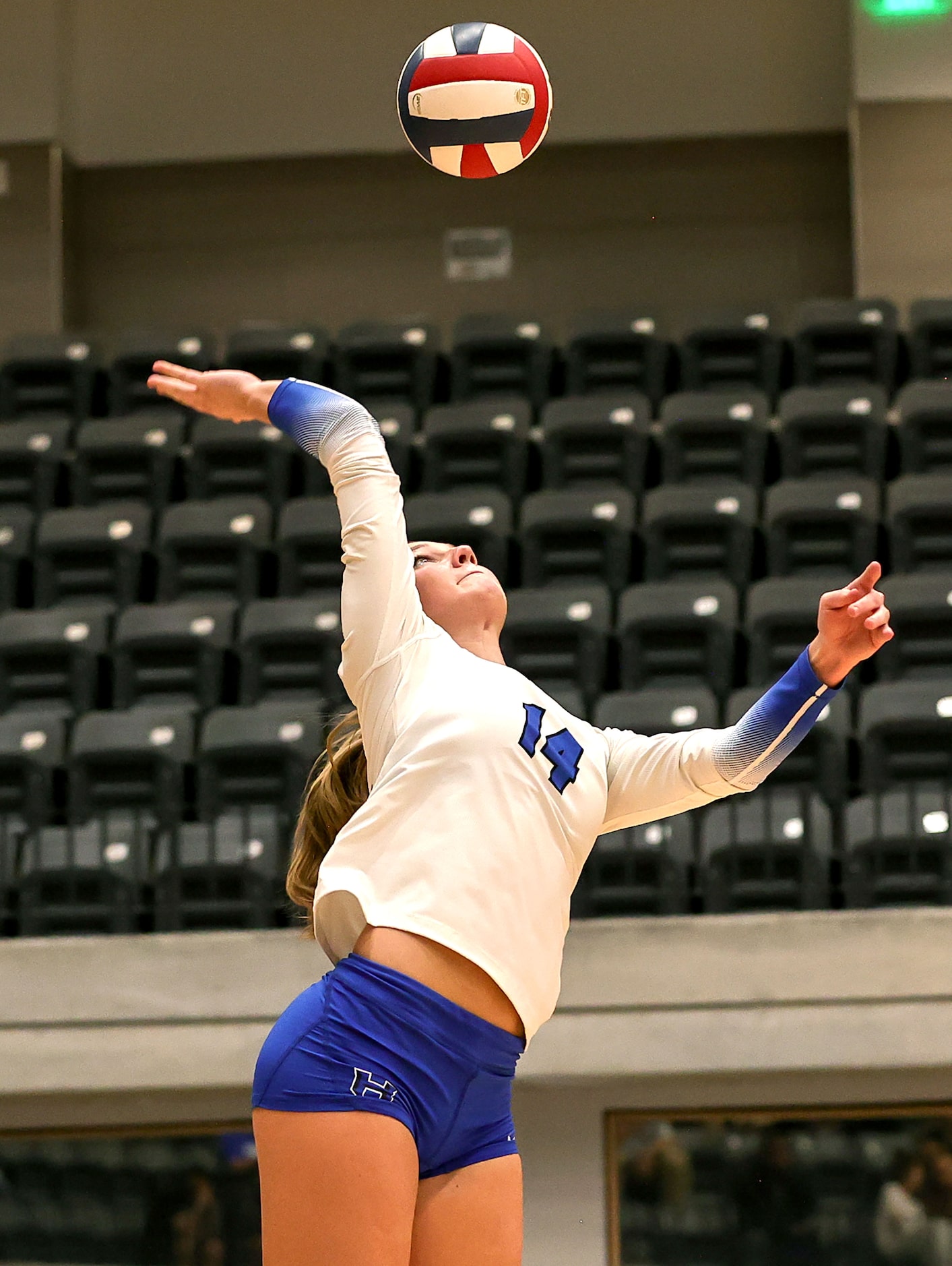 Hebron's Haley Kerstetter attempts to serve to Southlake Carroll during a Class 6A Division...