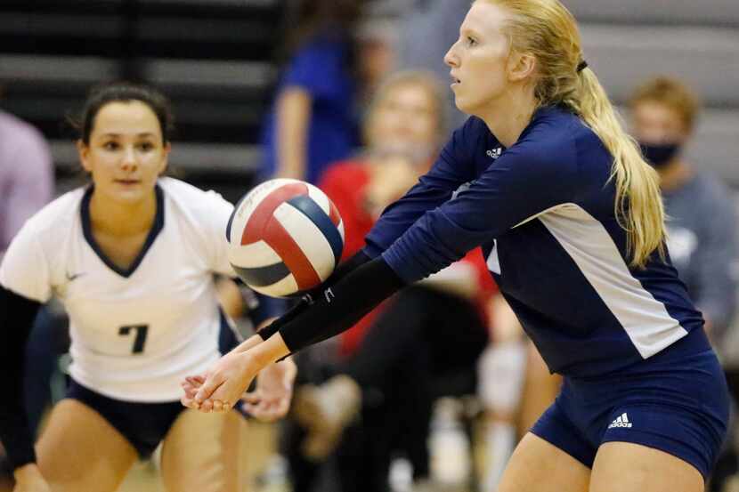 Flower Mound High School outside hitter Kaylee Cox (6) makes a pass during game two as...