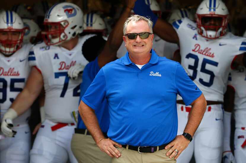 SMU head coach Sonny Dykes with his team just before the kickoff against TCU on Sept. 21 in...