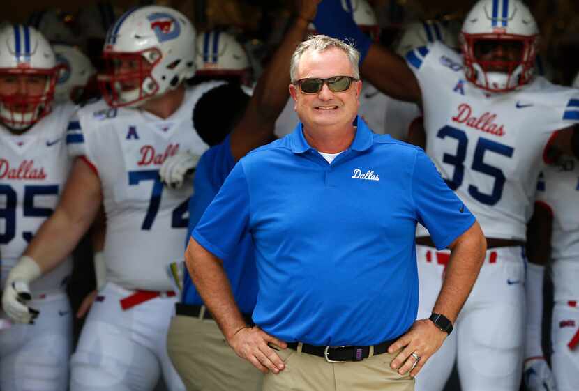 SMU head coach Sonny Dykes with his team just before the kickoff against TCU on Sept. 21 in...