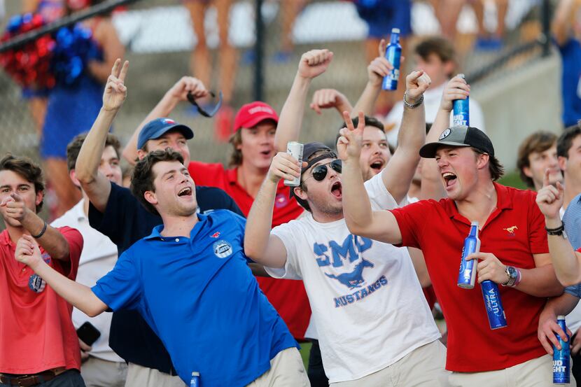 Southern Methodist Mustangs fans near the end zone cheer for their team as they play Stephen...