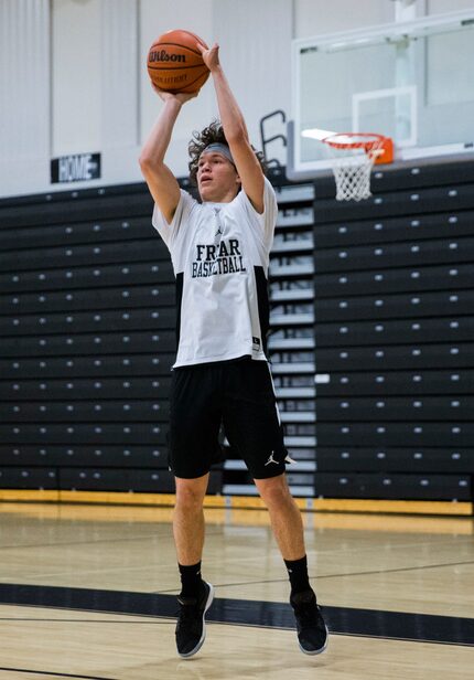 Bishop Lynch High School varsity basketball player Jarett Nunez takes a shot during practice...