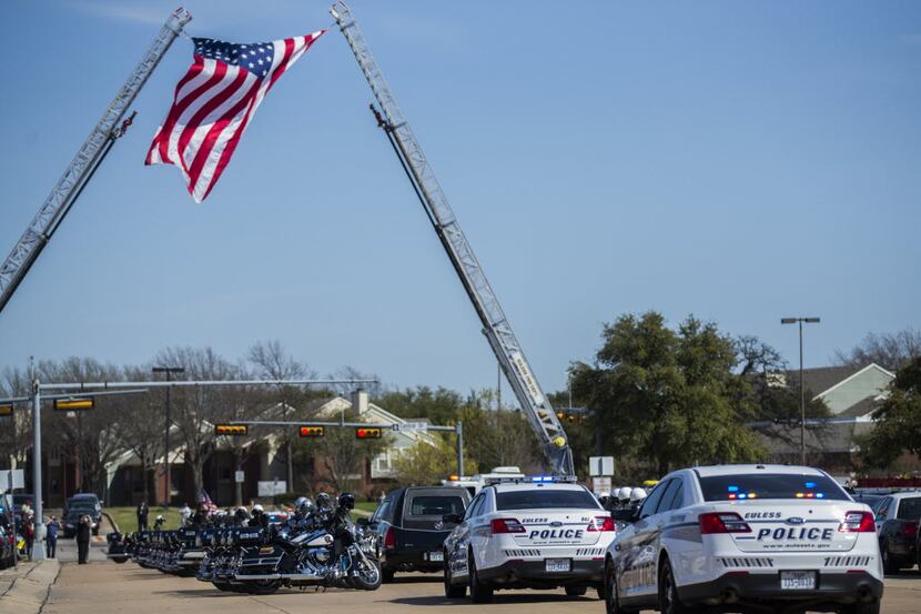 Members of the Patriot Guard Riders motorcycle club followed as the body of Chad Littlefield...