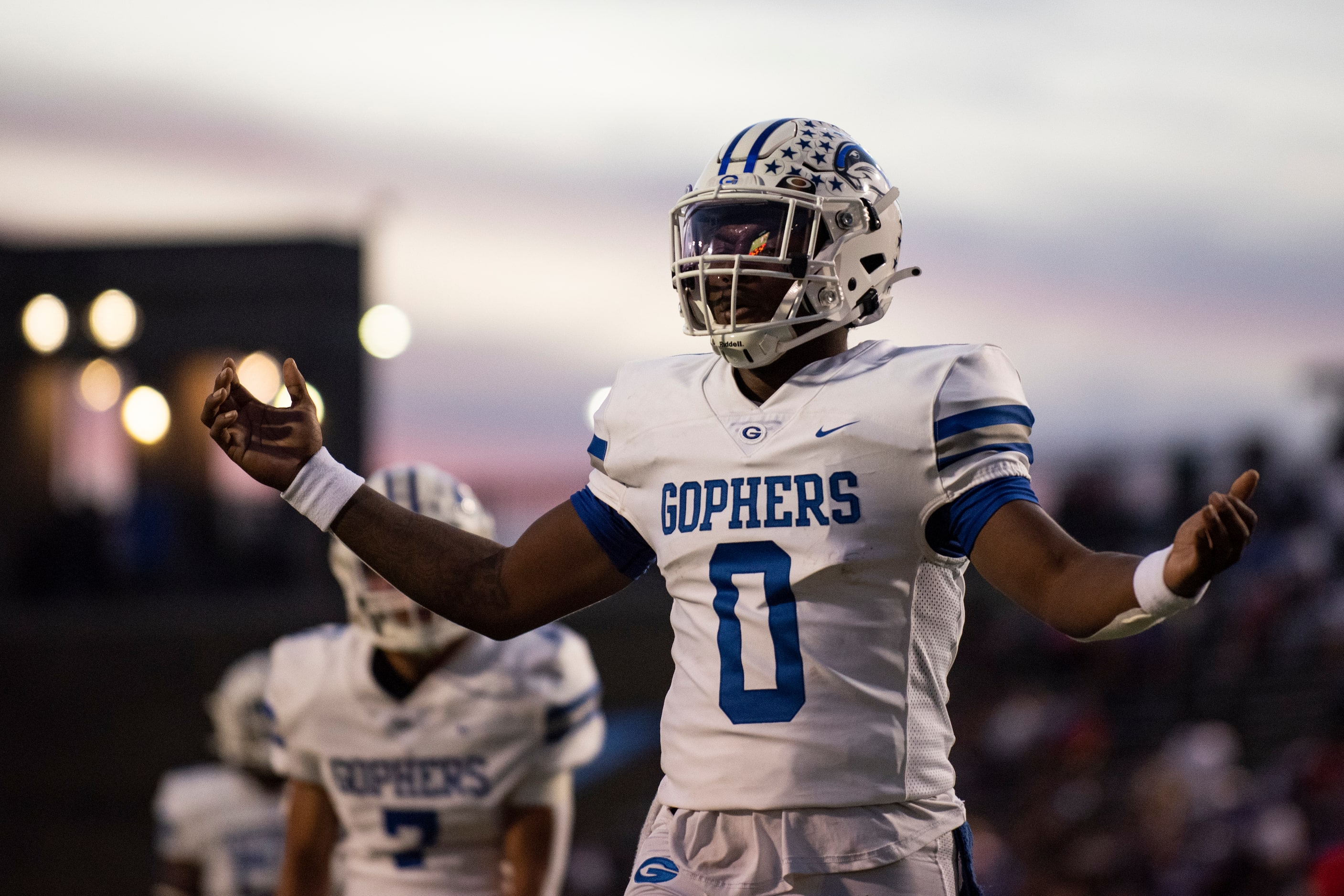 Grand Prairie senior Savion Red (0) puts his hands up in confusion to a referee after a...