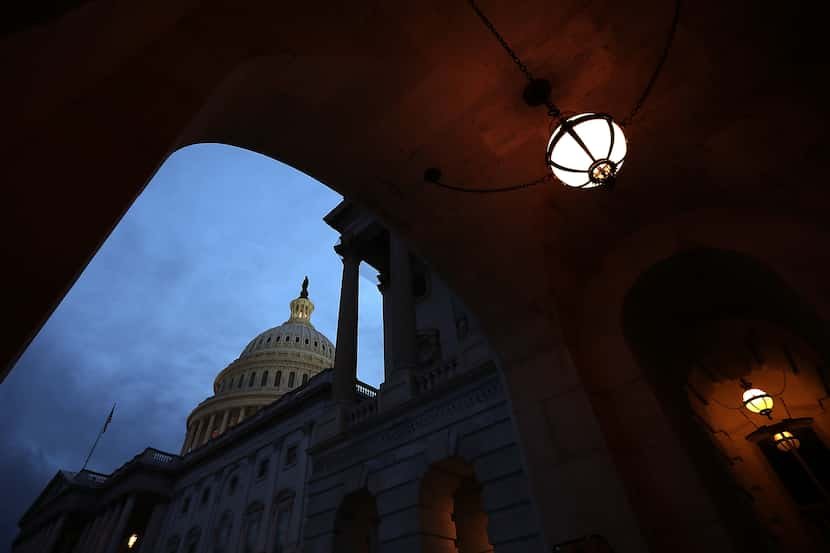 The U.S. Capitol is shown at sunset October 15, 2013 in Washington, DC. during a government...