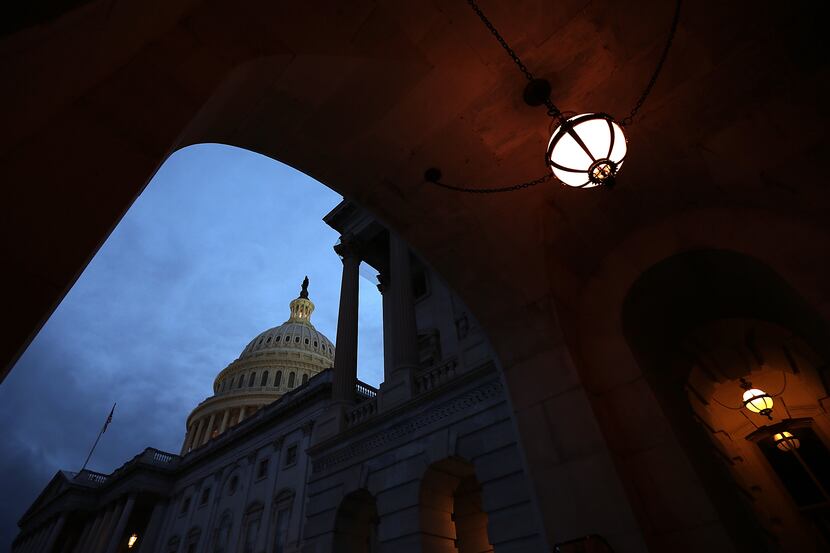 WASHINGTON, DC - OCTOBER 15:  The U.S. Capitol is shown at sunset October 15, 2013 in...