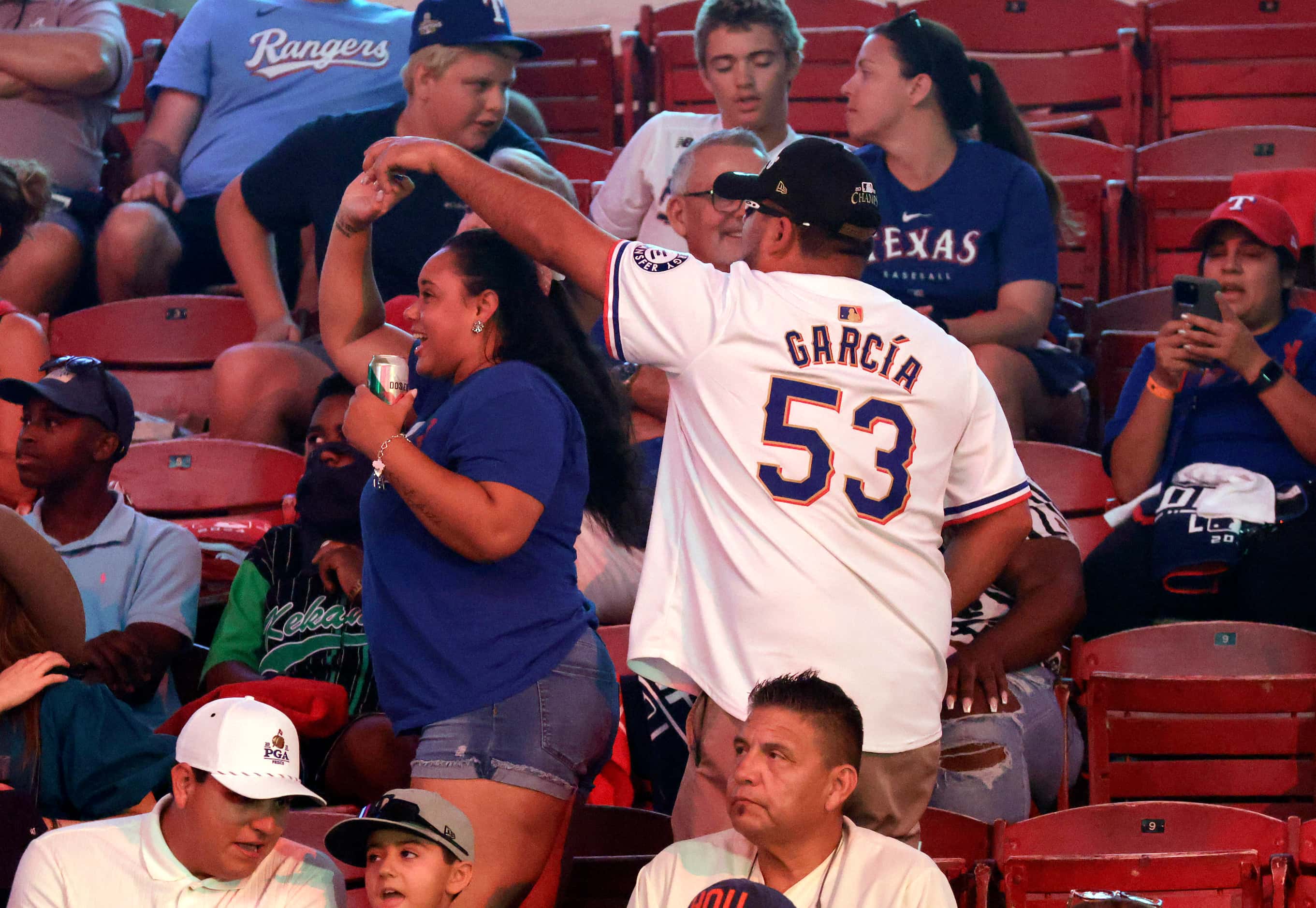 Texas Rangers fans stand and dance as their 30th pick in the MLB Draft is about to be made...