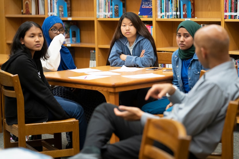 Sam Tasby Middle School students (from left) Rebecca Cawi Sang, ZamZam Ali, Dar Cuai, and...