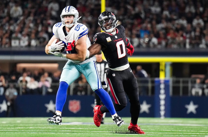 Dallas Cowboys tight end Luke Schoonmaker (86) makes a catch as Houston Texans linebacker...