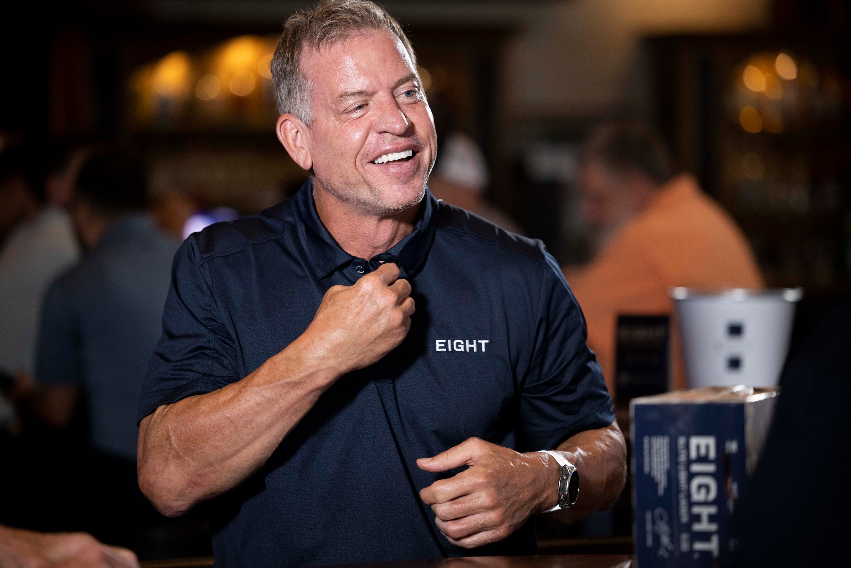 Former Cowboys quarterback Troy Aikman speaks to reporters at Katy Trail Ice House during a...