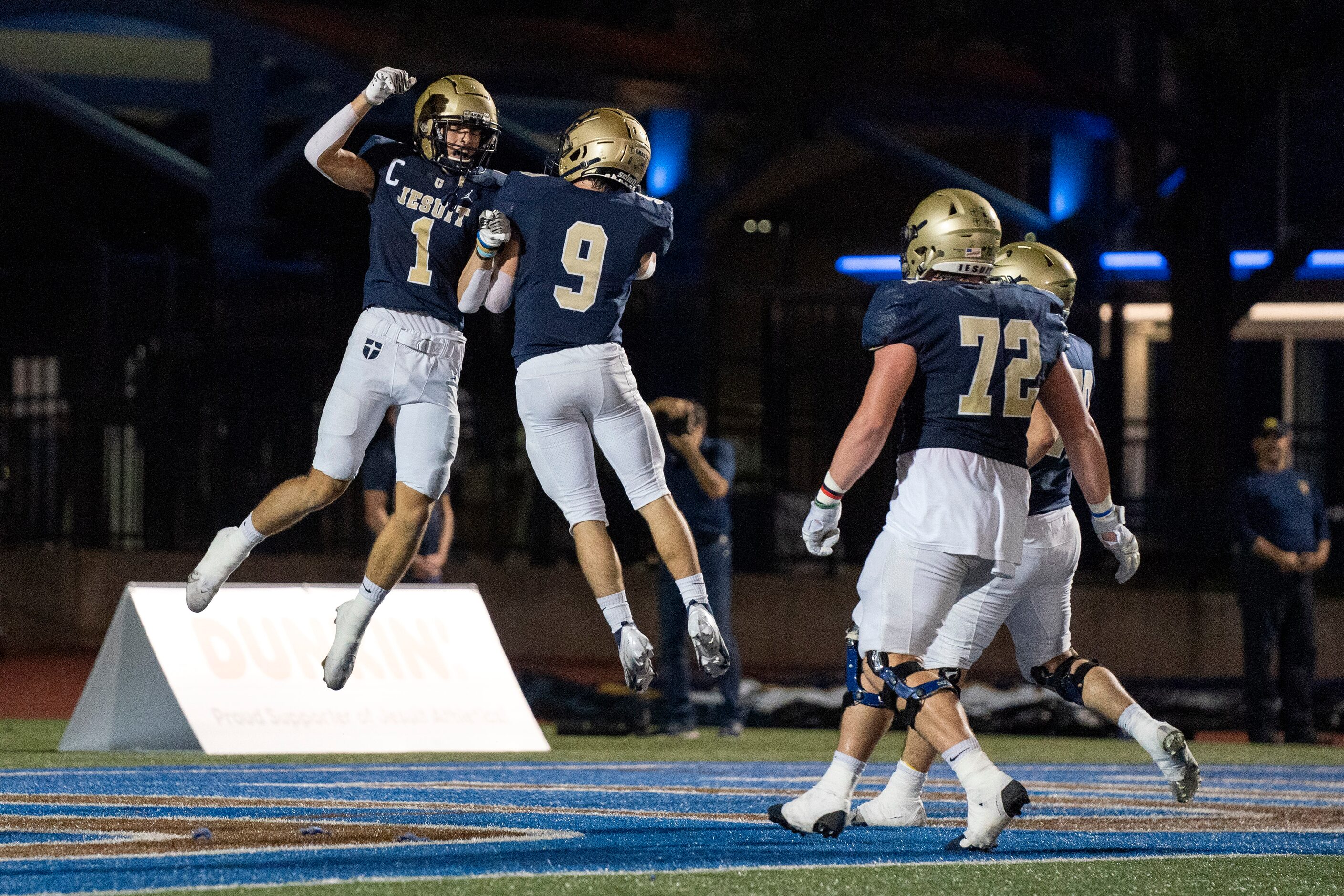 Jesuit senior wide receiver Hunter Krepp (1) and senior running back Landon Usry (9)...