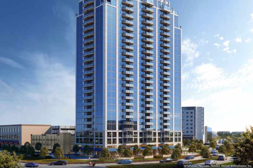 The 25-story SkyHouse Frisco Station apartment tower is being built near the Dallas North...