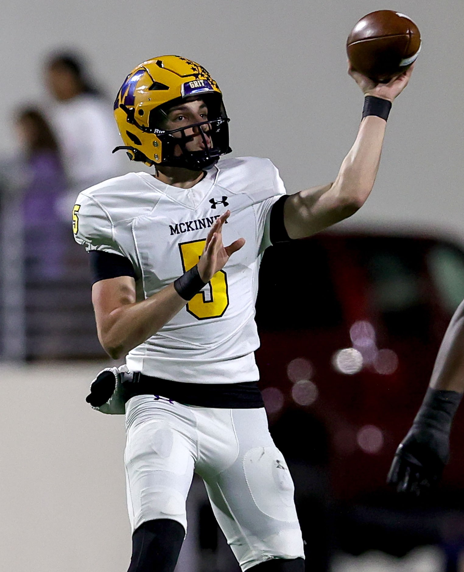 McKinney quarterback Jeremiah Daoud attempts a pass against Denton Guyer during the first...