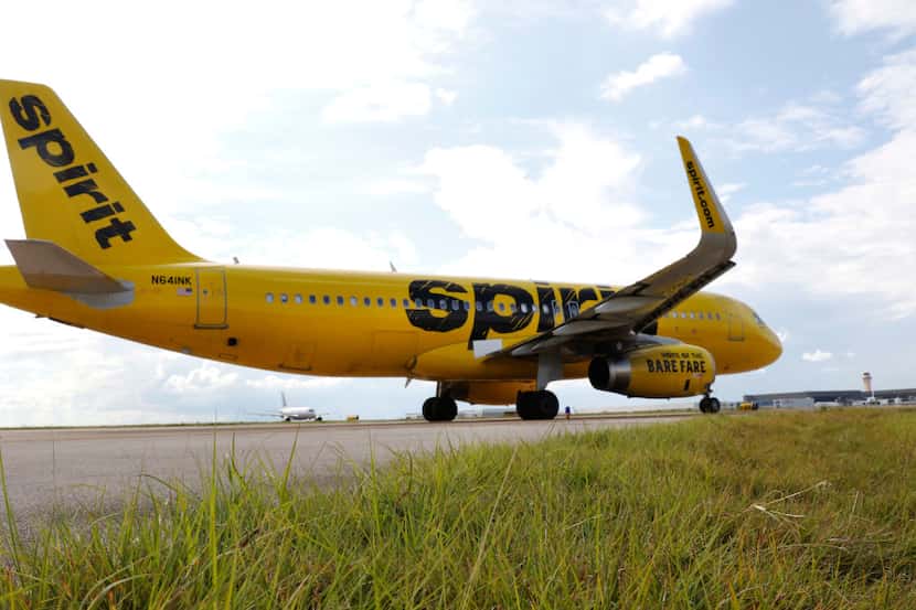 A Spirit Airlines plane taxis at DFW International Airport on Aug. 23. 