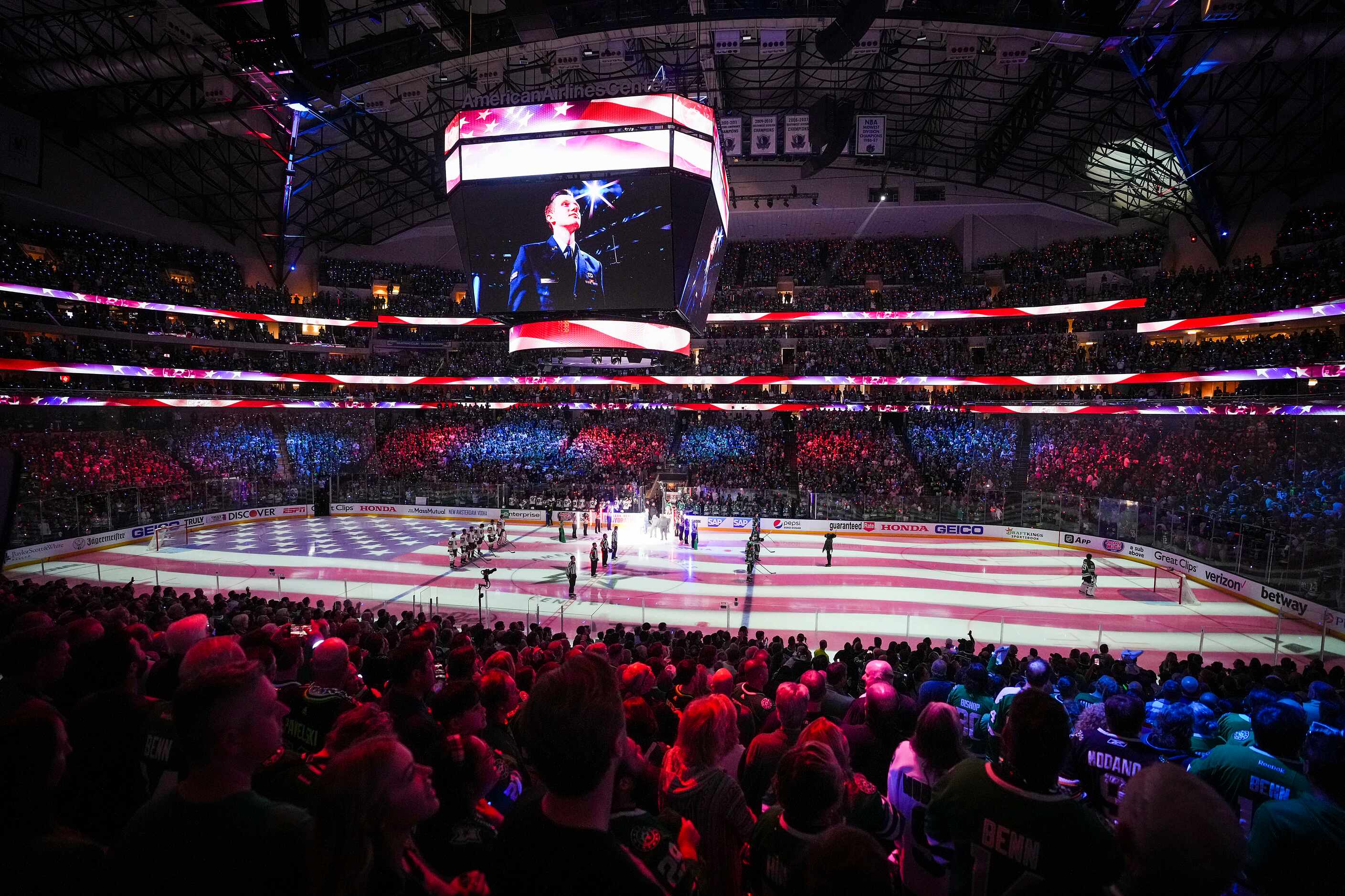 Players stand for the national anthem before Game 6 of the Stanley Cup Western Conference...