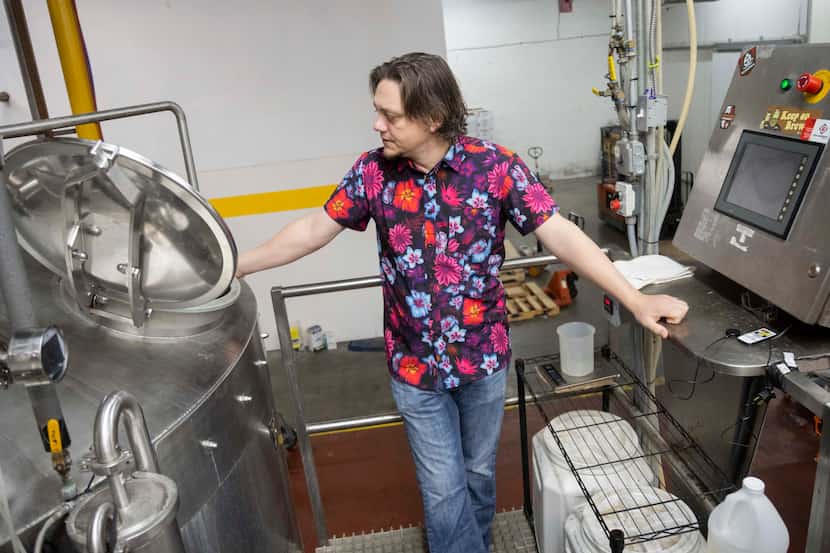 Wim Bens, founder and president of Lakewood Brewing, stands on the brew deck during a tour...