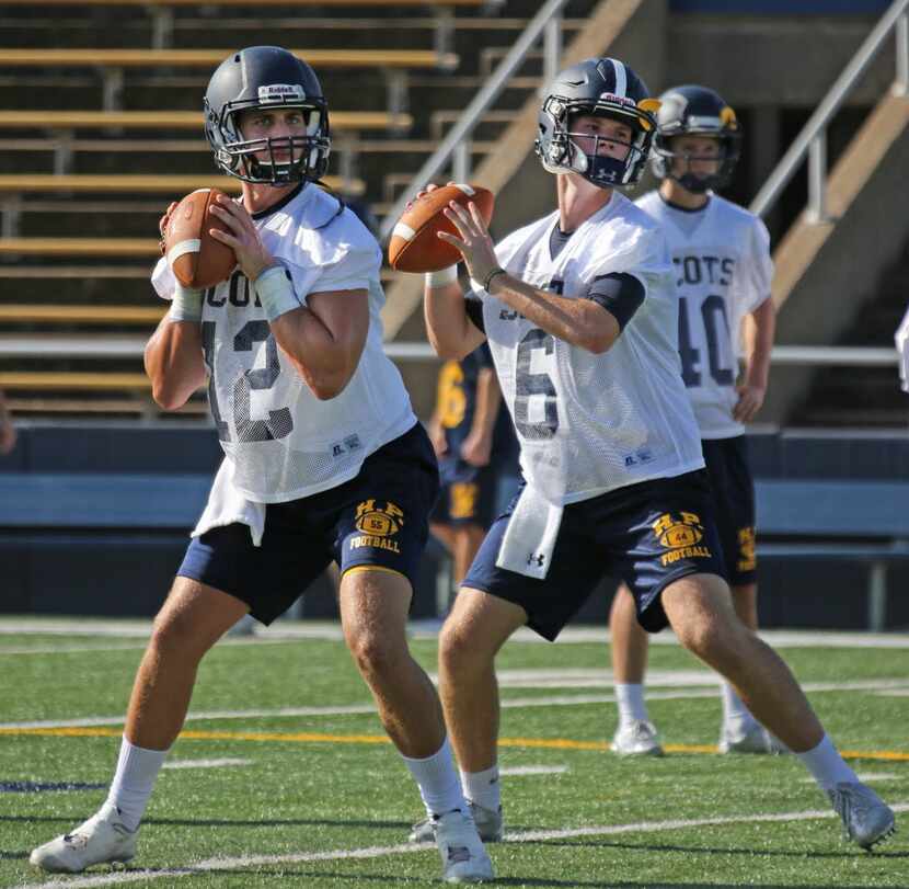 Highland Park High School quarterbacks Michael Clarke (12) and Jack Fain (6) are pictured at...
