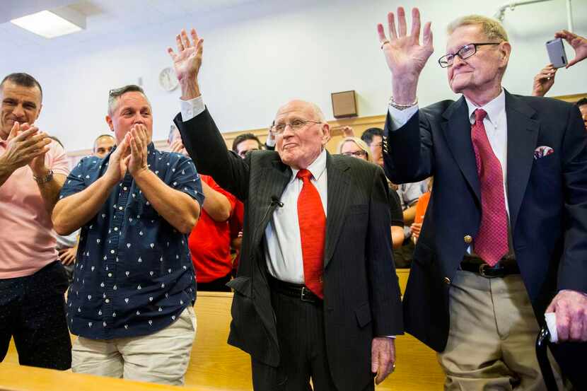 George Harris and Jack Evans  (right) waved as other couples cheered the announcement Friday...