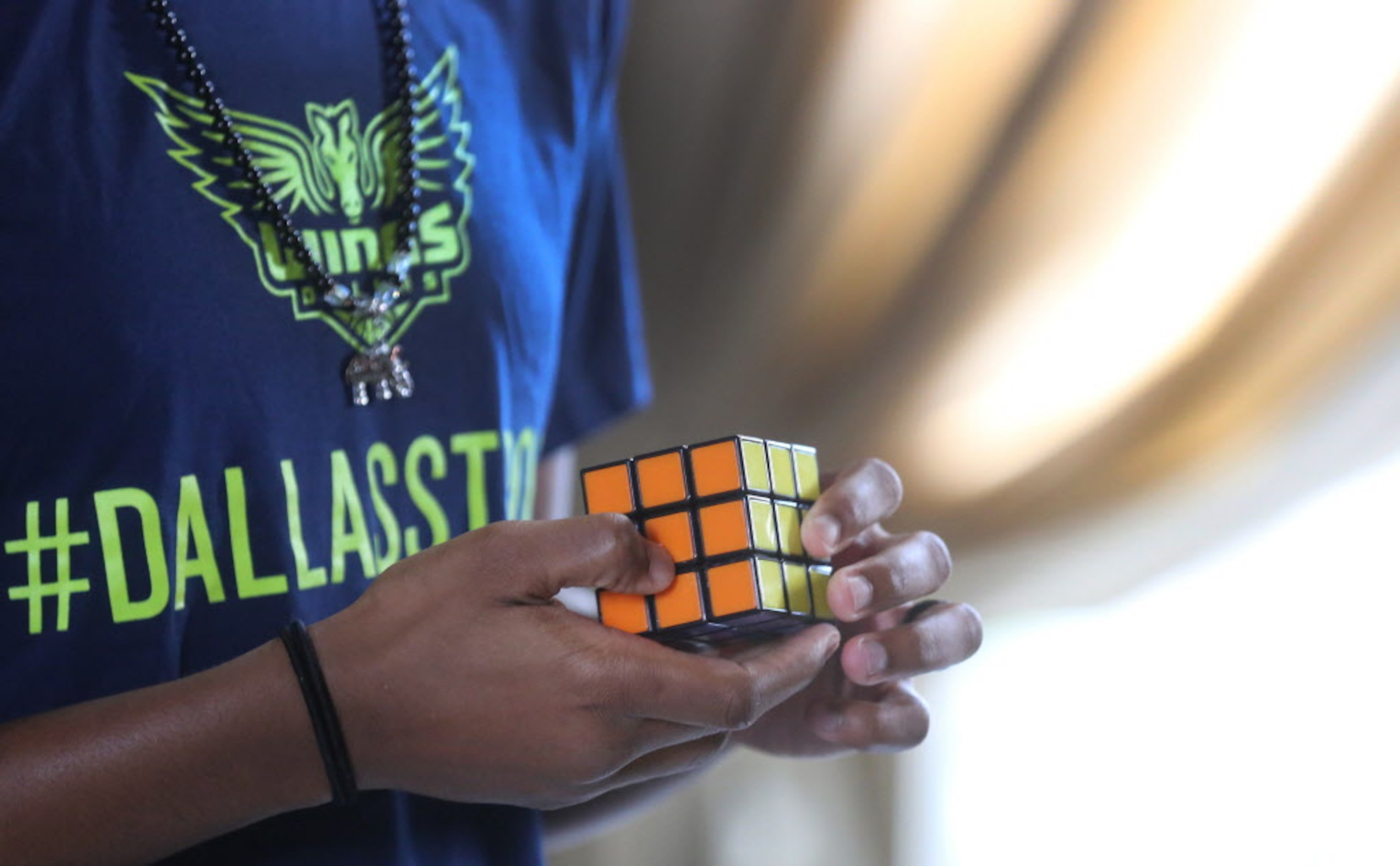 Dallas Wings guard Kaela Davis, who can solve a Rubik's Cube, is photographed at the home...