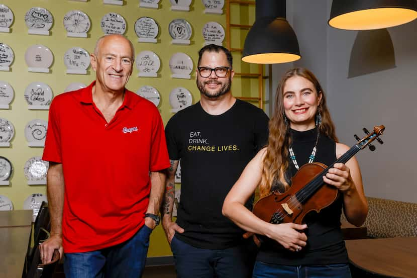 Broadcaster Eric Nadel (left), Café Momentum founder Chad Houser (center) and Grace Quebe of...