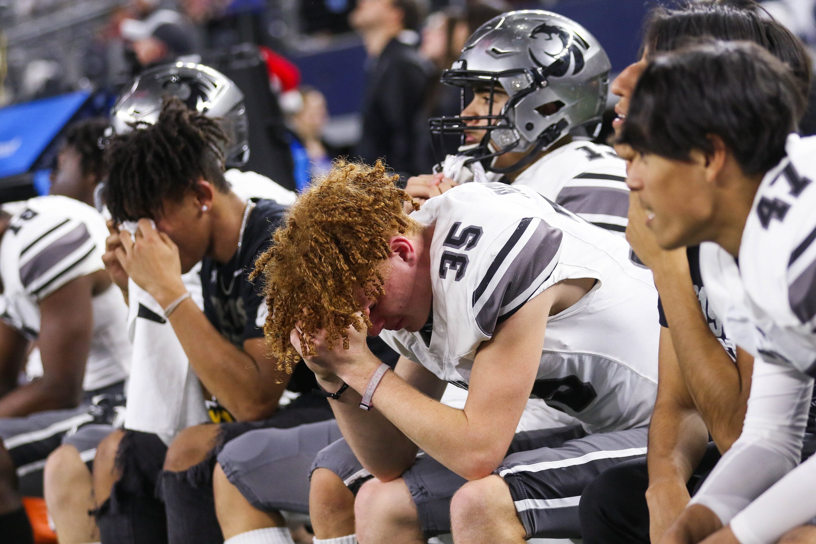 Denton Guyer players watch the fourth quarter of a Class 6A Division II state championship...