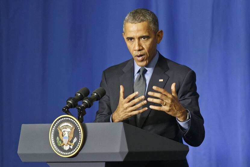 
U.S. President Barack Obama gestures during a news conference at the Organization for...