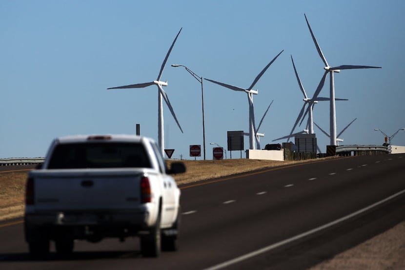 Wind farms, such as this one in Colorado City, are a common sight in West Texas. Amazon...