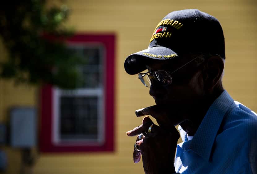U.S. Army veteran Richard Overton, then 111, sat on the front porch smoking a cigar on May...