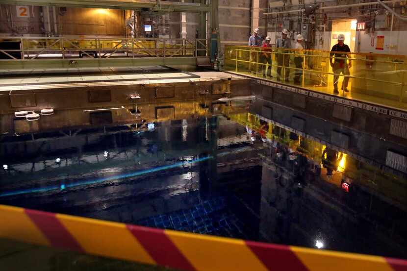 
Pools hold spent fuel rods at Comanche Peak Nuclear Power Plant in Glen Rose. Tens of...